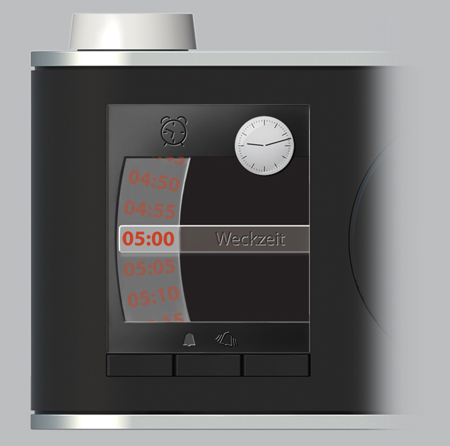 Wecker. Die Weckzeit ist in 5-Minuten-Schritten per Jog Dial einstellbar. alt text goes here